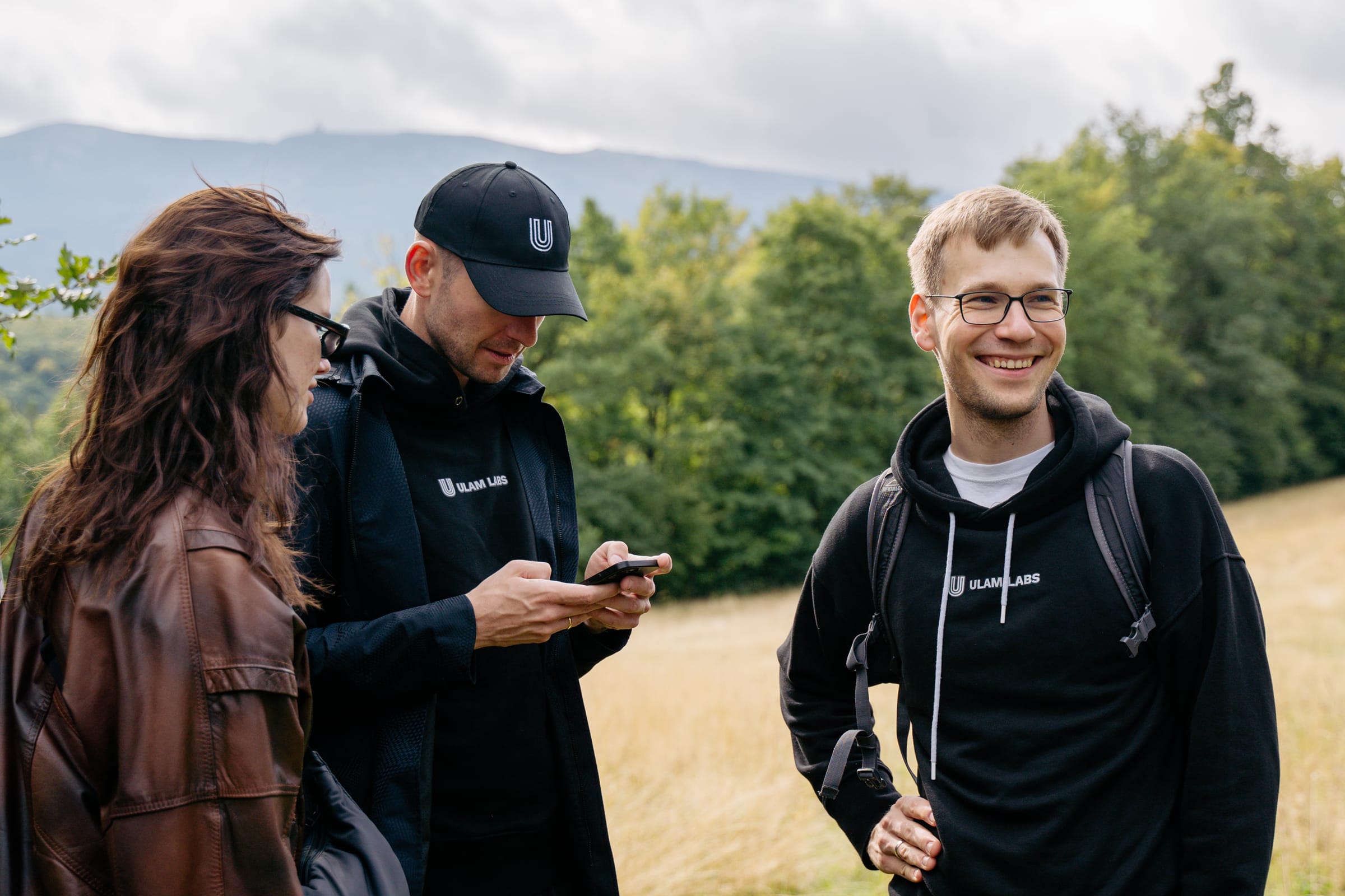 Two team members outdoors at an offsite