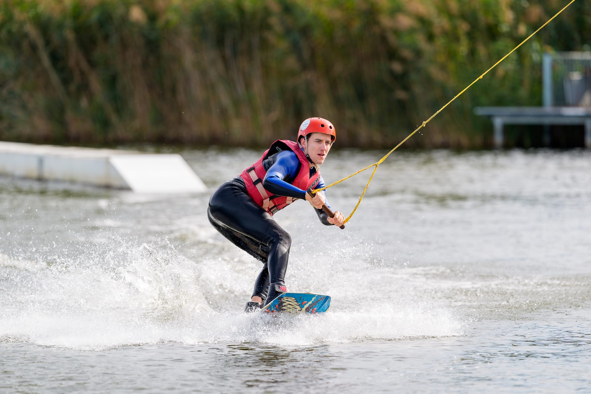 Team member wakeboarding