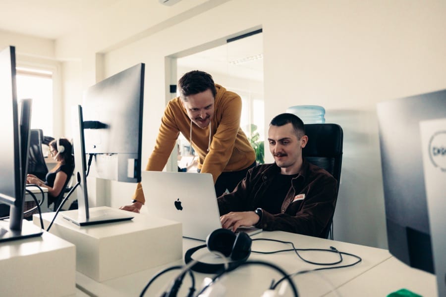 ULAM LABS in-house product team collaborating in the office