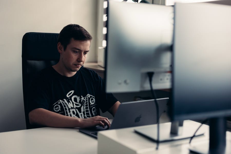 ULAM LABS engineer mapping workflows at a workstation