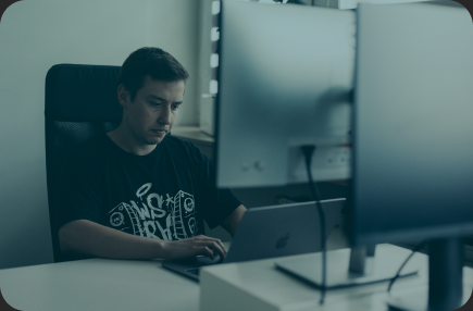 Senior engineer at workstation building compliance-ready architecture