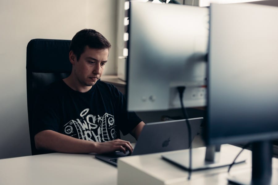 ULAM LABS engineer working at a desktop workstation